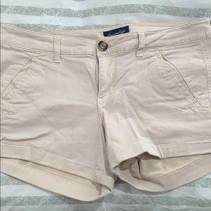 Light pink American eagle shorts.